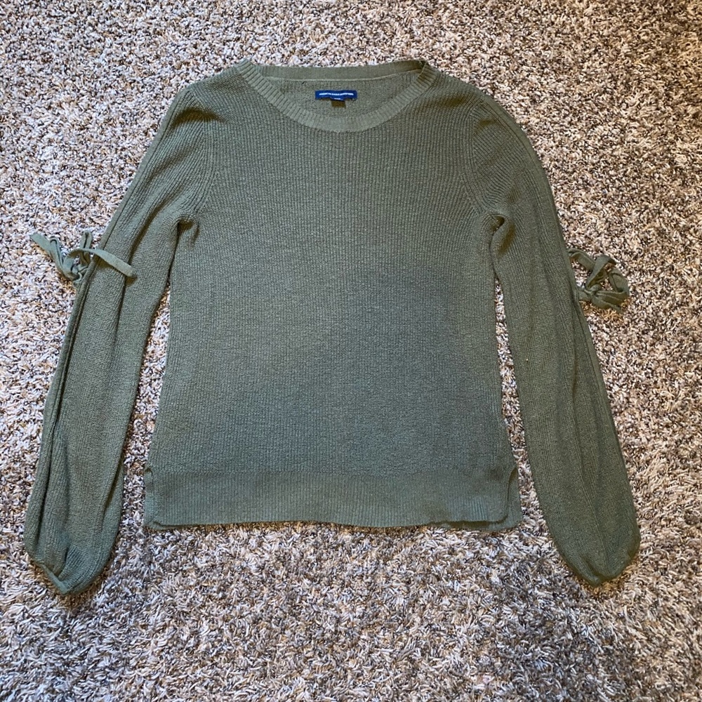 Open arm green shirt